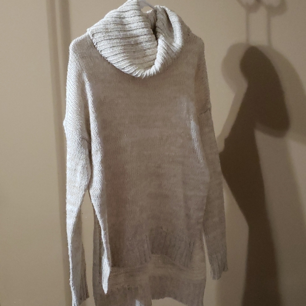 Cream sweater with side slits